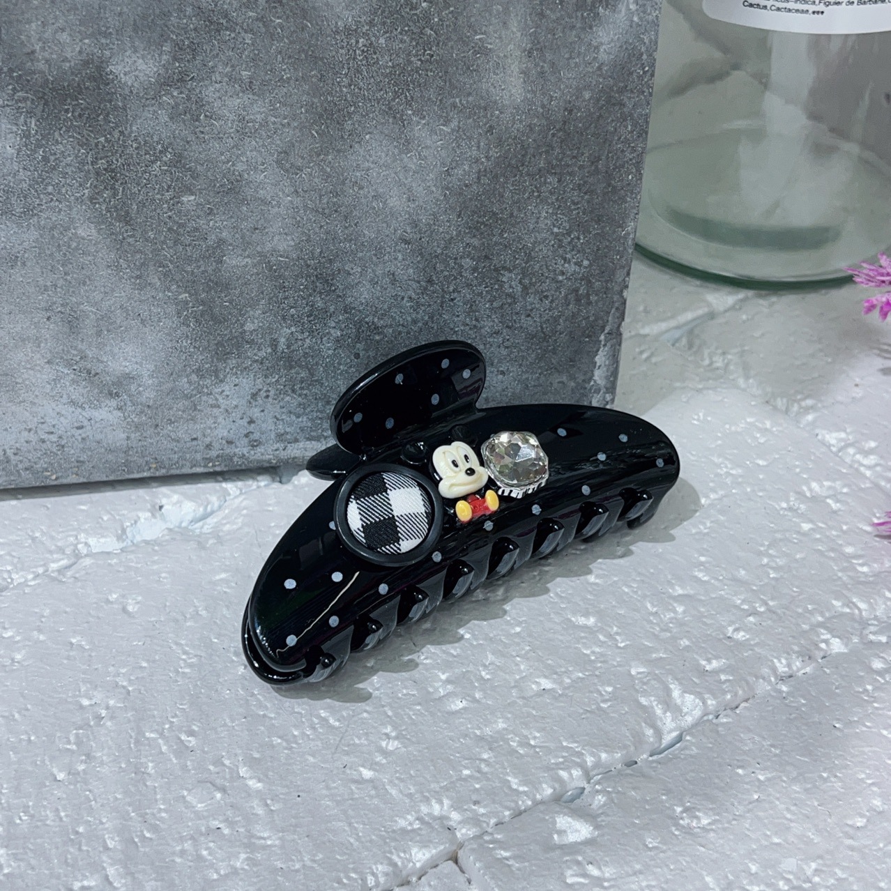 A new black and white polka dot Mickey Mouse bow letter hair clip from South Korea, a fashionable and high-quality shark clip hair accessory for women pic 1