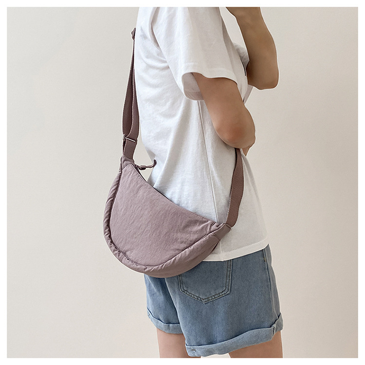 斜挎包女新款单肩包学生女包休闲包运动小包夏季帆布包日系饺子包详情27