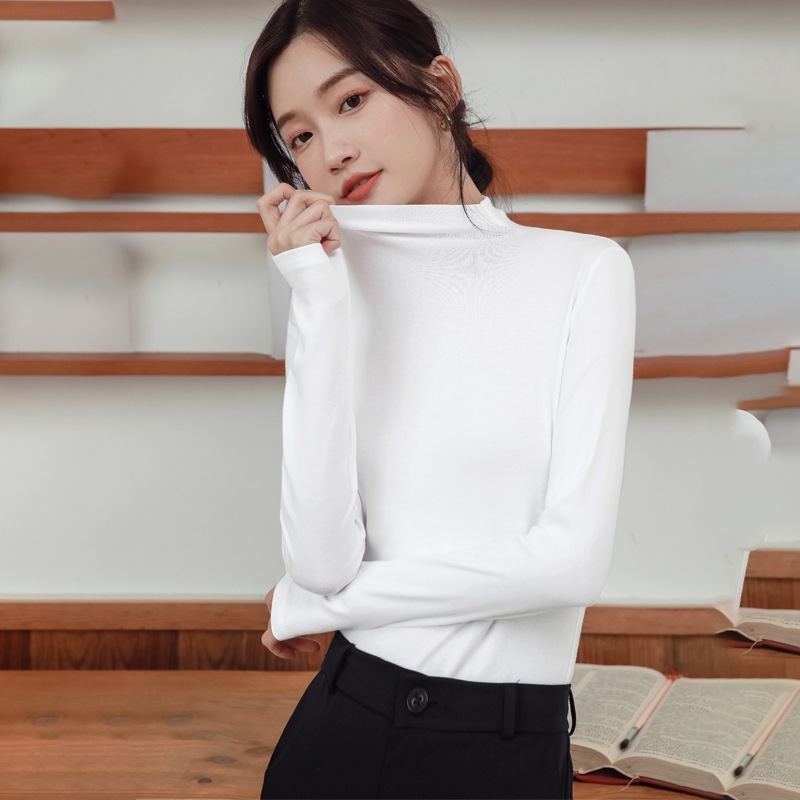 The 2022 autumn and winter new style base shirt for women is a semi-high-neck long-sleeved solid color with black fungus edges, paired with a fitted and warm German velvet top pic 2