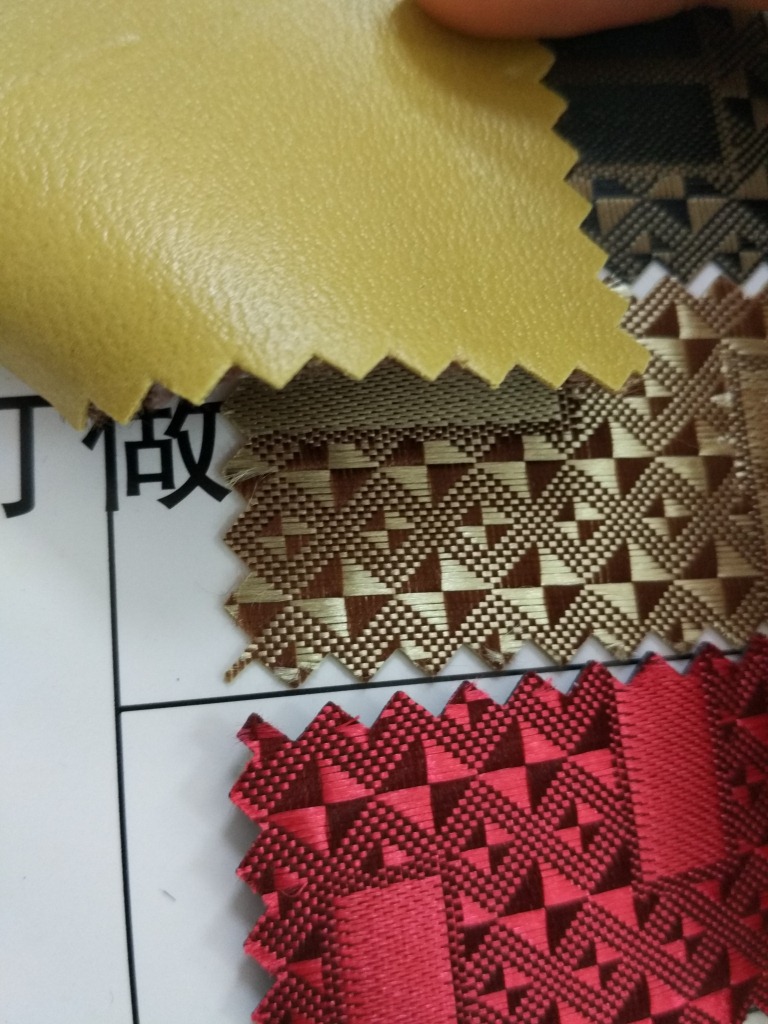 厂家直销多款多色提花布60丝羊皮纹提花发泡时尚背包手袋公文包详情4