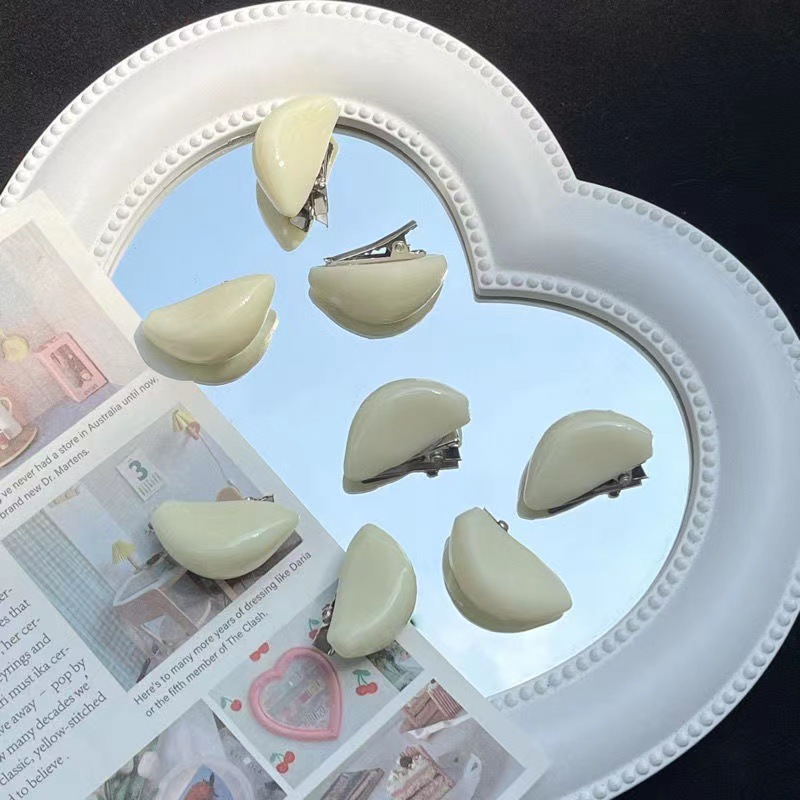 A funny and fun mini garlic hair clip, a bangs clip, and a creative garlic clove hair clip for your best friend as a gift and hair accessory pic 8