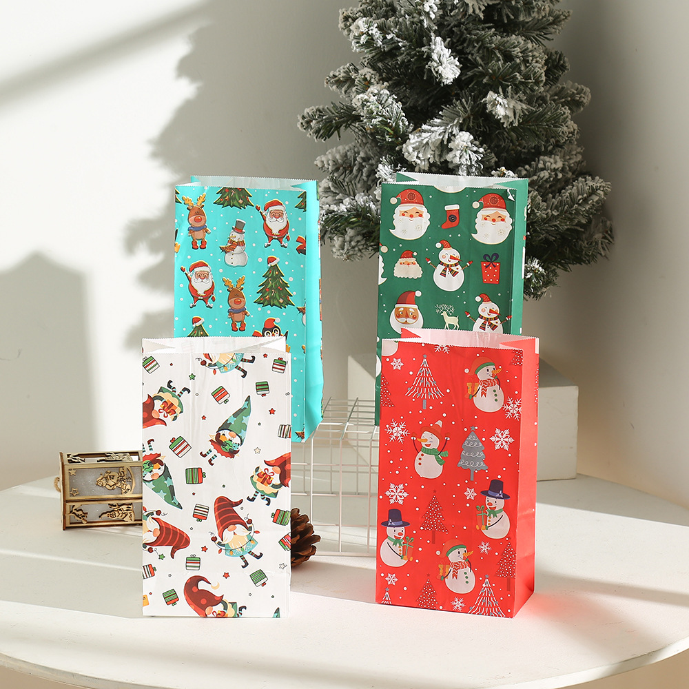 Wholesale of Christmas cartoon kraft paper handbags in stock, universal gifts for birthday and festival parties, and candy packaging bags pic 2