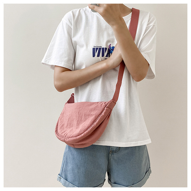 斜挎包女新款单肩包学生女包休闲包运动小包夏季帆布包日系饺子包详情14