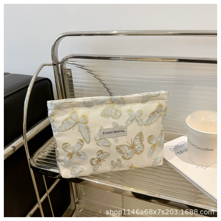跨境蝴蝶化妆包小清新便携护肤品收纳袋旅行洗漱包帆布方包手拿包详情18