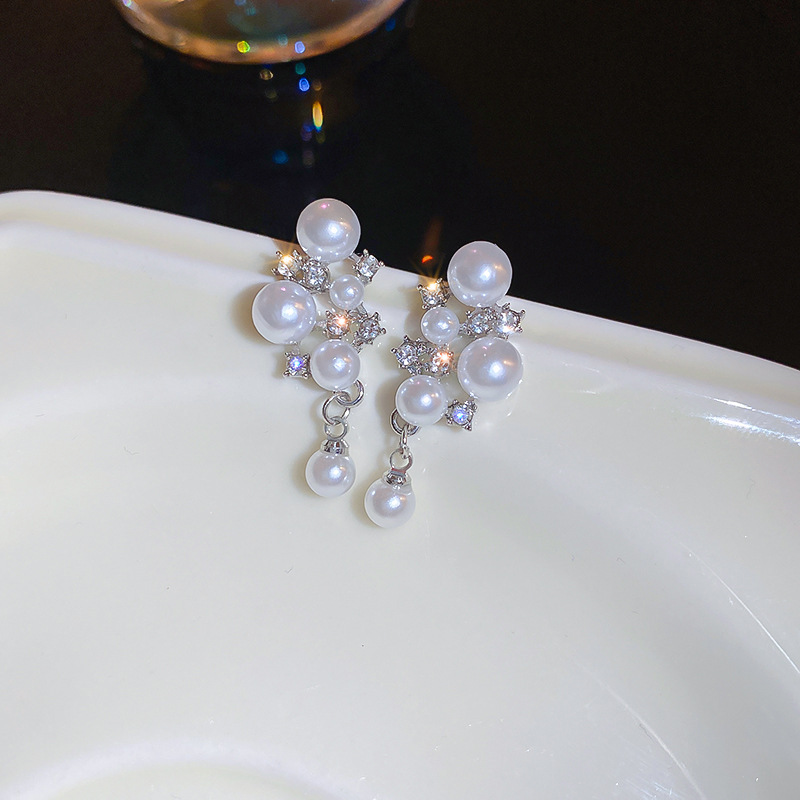 Silver needle diamond-encrusted heart-shaped flower earrings, European and American fashion style, square stud earrings, niche commuting new earrings wholesale pic 23