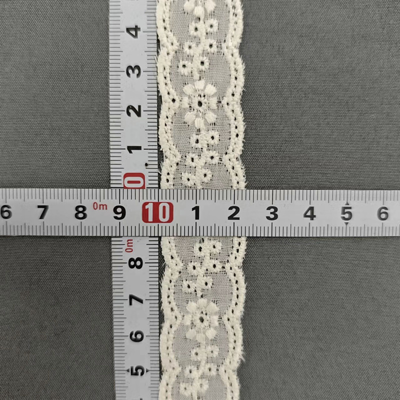 Wholesale of cotton embroidered lace, hollowed-out lace, embroidered skirt hem, clothing accessories, milk silk, perforated, barcode 2.5 pic 70