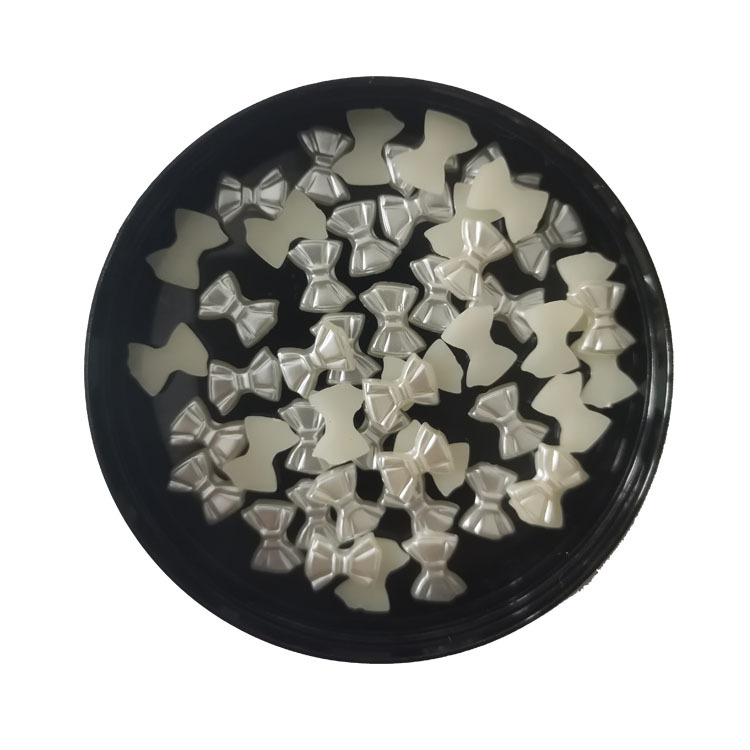 Factory direct sales of imitation pearl mobile phone diamond stickers, clothing accessories, diy handmade materials, bow tie pearls pic 1