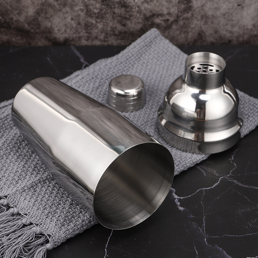 A 9-piece stainless steel cocktail shaker, cocktail shaker and mixing tool set with a bamboo base for storage pic 3