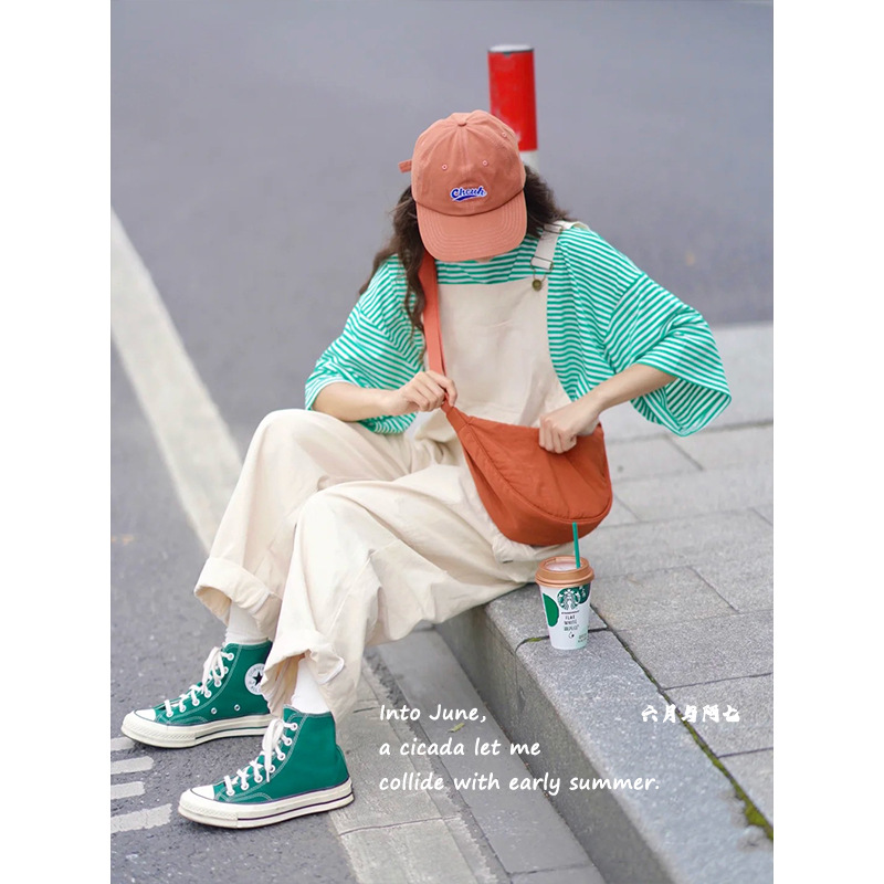 U家试衣间同款女斜挎包小红书尼龙饺子包学生单肩包布包工厂货源详情3