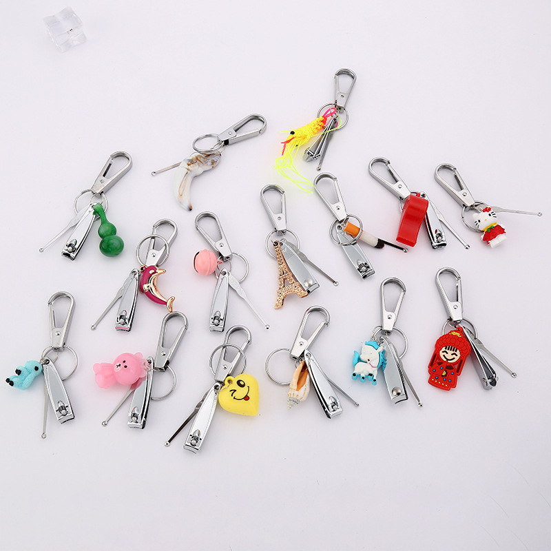 A 2-yuan store is selling hot nail clippers, cartoon metal, stainless steel nail clippers, ear spoons and keychains in 12-piece sets for wholesale pic 17