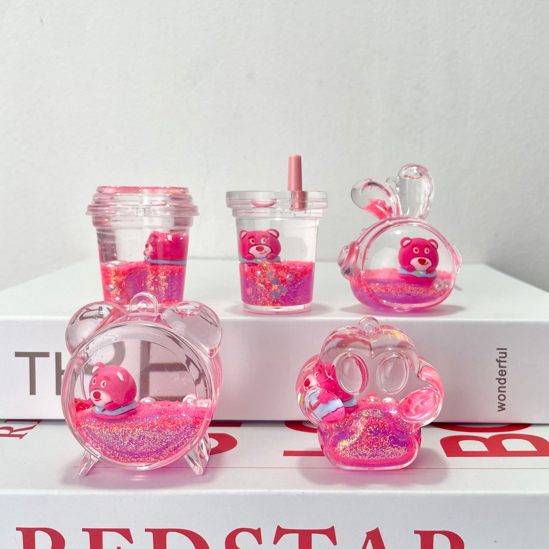 Luminous strawberry bear oil flowing sand bottle liquid pendant, hanging piece, acrylic keychain, key chain accessories wholesale pic 1