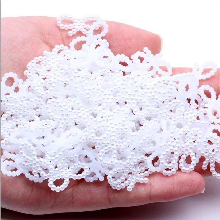 The manufacturer produces and sells v106 bow tie, bow tie, hollow pearl DIY jewelry accessories, pure white and off-white imitation pearl pic 1