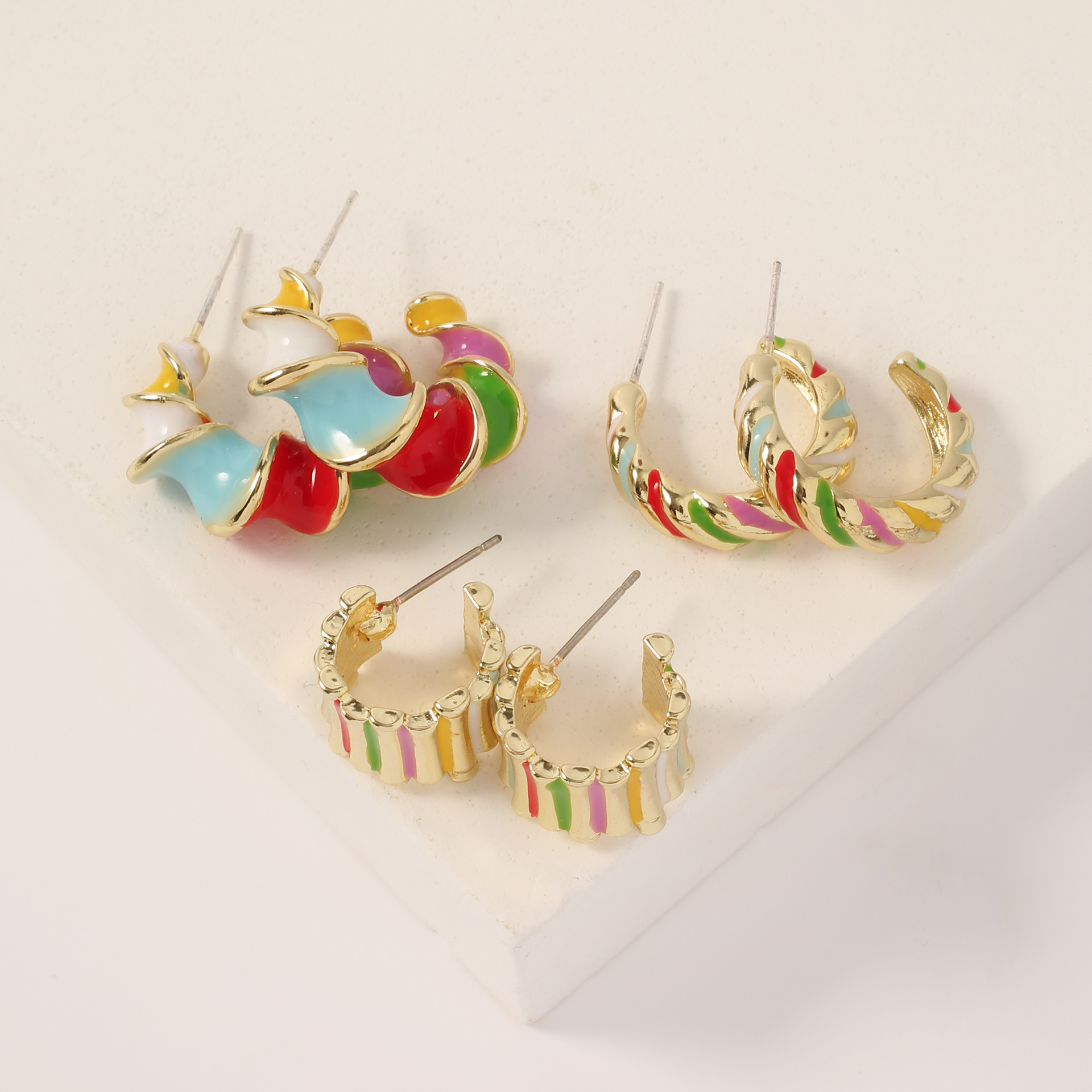 The new retro oil-dripping colored spiral earrings are fashionable, simple, individual, unique, niche and high-end design for women pic 2