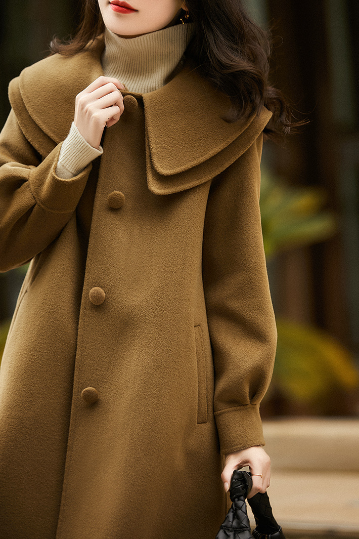 A new Korean-style woolen coat with a doll collar for women in autumn and winter, which is slimming, concealing and making one look younger pic 2