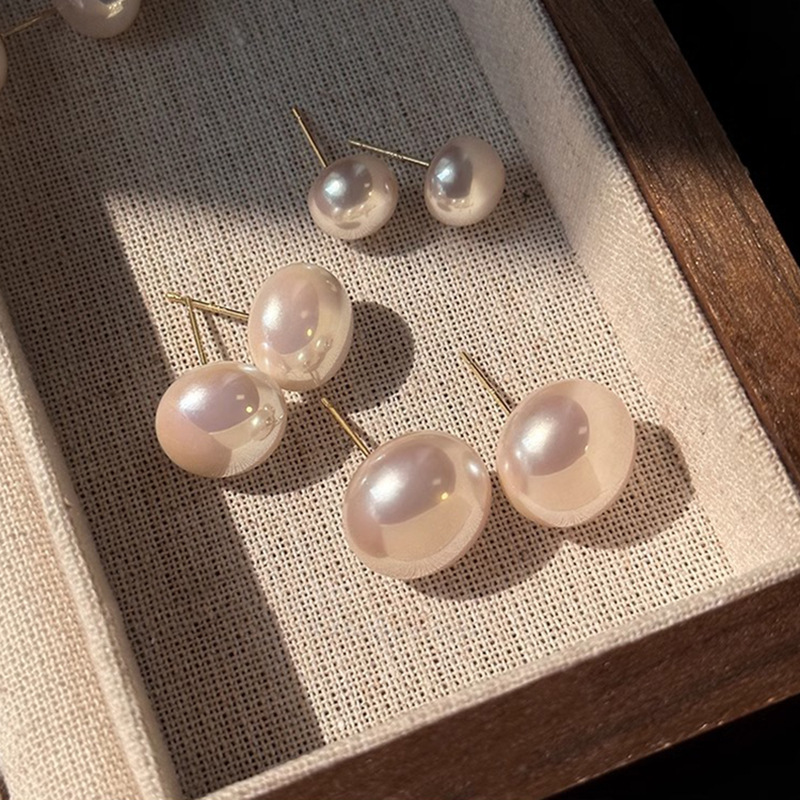 Shi Family Steamed Bun Pink Light Milk White Pearl Stud Earrings S925, pure silver needle, a niche high-end style, versatile new earrings pic 3