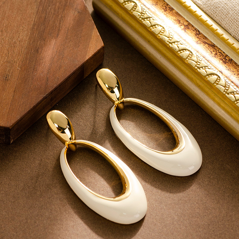 French elegant, retro, mid-style oil-dripping, hollowed-out geometric oval earrings, a niche and unique design sense, silver needle earrings pic 9