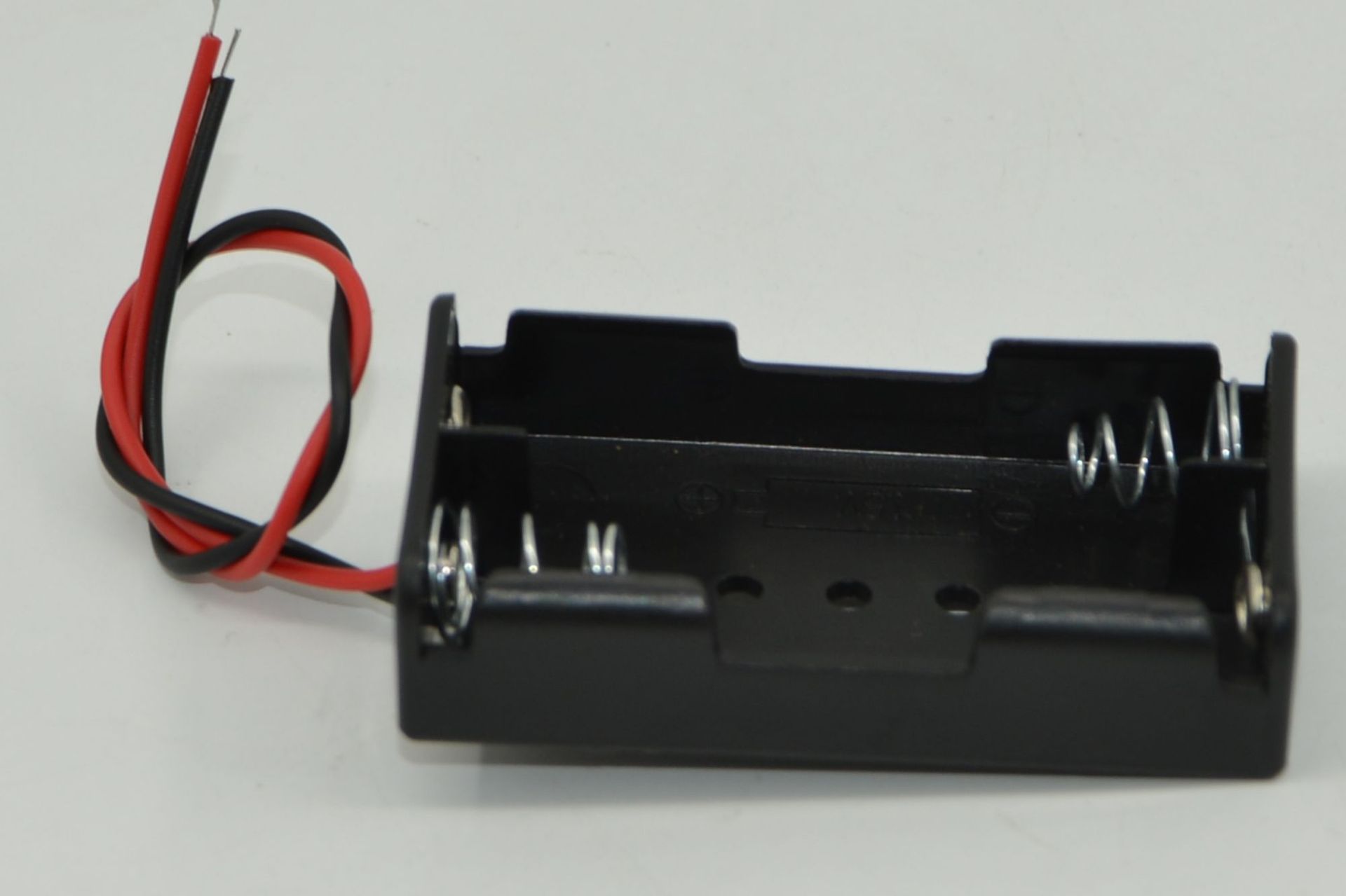 Two AA battery boxes, uncovered with wires, black power supply, positive and negative DC power supply, student experiment science physics pic 5