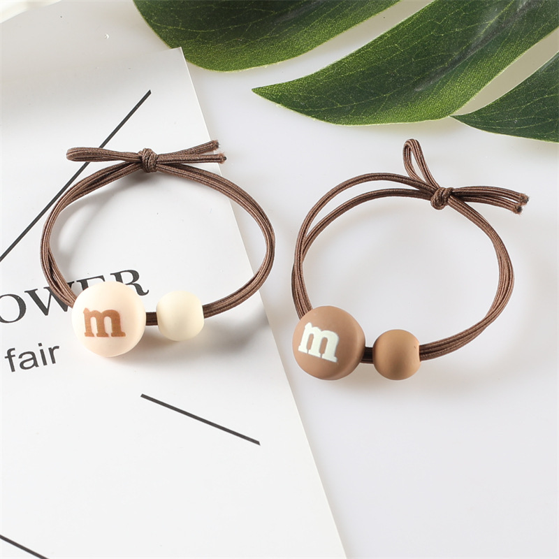 Korean version of the popular ins milk tea-colored M-bean hair band, high-elasticity hair tie rubber band, two-yuan store wholesale hair accessory supply pic 14