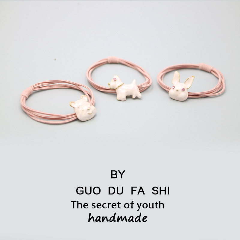 The pink rabbit and bear hair tie from the country of accessories, the cute cartoon hair tie and the adorable multi-strand hair band pic 1