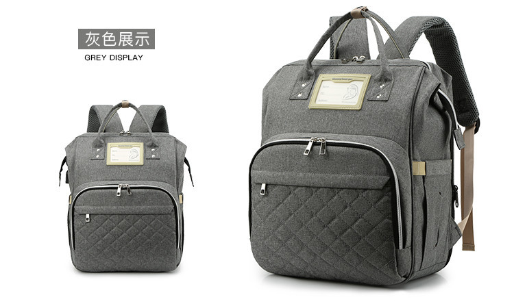 Nuevo modelo mommy bag cama cama plegable baby bag mamá multifuncional recargable impermeable bordado hilo mochila cama cross-border blast pic 32