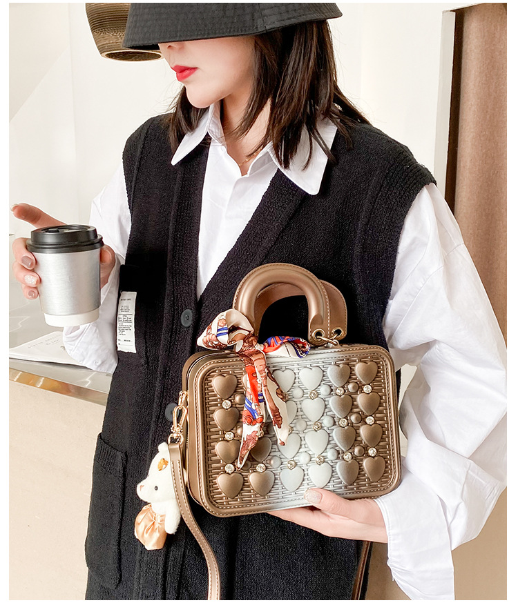 The 2021 Korean version of the trendy tote bag features a ribbon bow, an Instagram niche design with rivets and a slanted crossbody bag made of PU pic 23