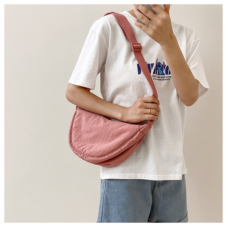 斜挎包女新款单肩包学生女包休闲包运动小包夏季帆布包日系饺子包详情11