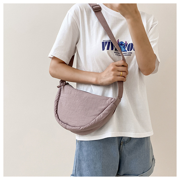 斜挎包女新款单肩包学生女包休闲包运动小包夏季帆布包日系饺子包详情24