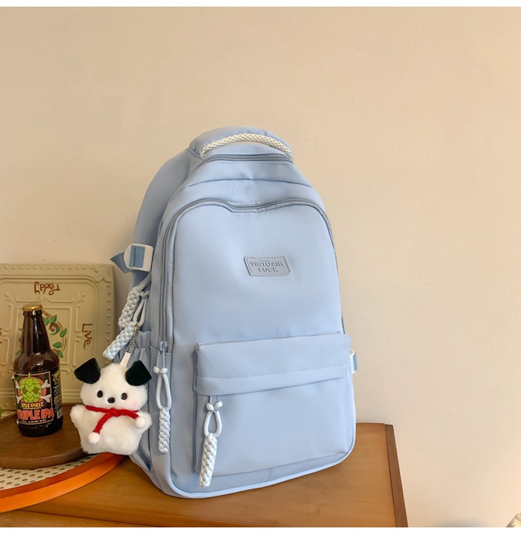 书包大容量高颜值初高中生新款双肩包大容量纯色简约防泼水背包详情30