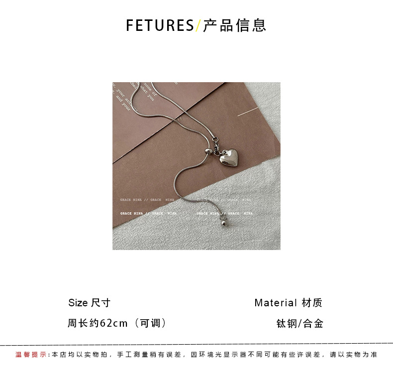 Minimalist silver heart-shaped pendant necklace for women, a light luxury and high-end style titanium steel pull-out long sweater chain accessory pic 1