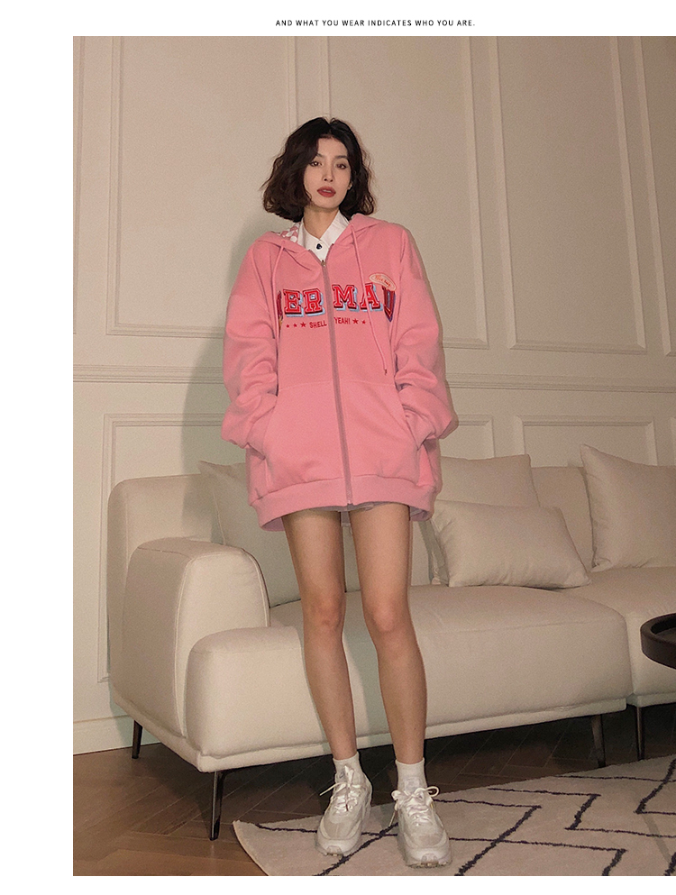 A woman wearing a cardigan with a hood on both sides in a loose pink, niche design with a checkered pattern is particularly stylish pic 22