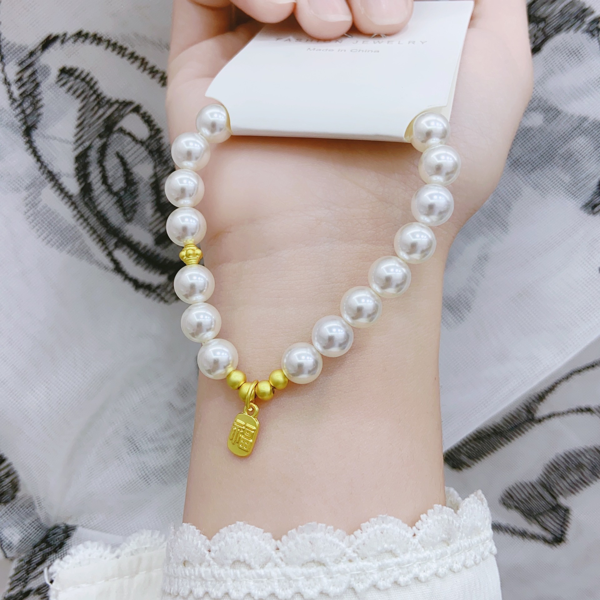 Pearl lotus wall combination pearl bracelet, elastic rope bracelet, lotus pod pendant, children's street stall accessories, gold pearl bracelet supply pic 23