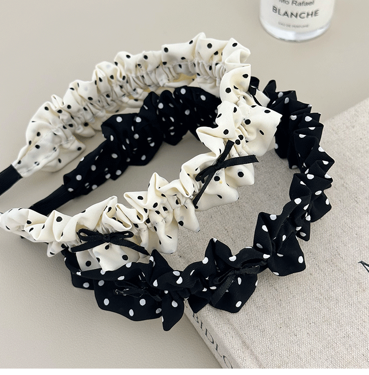 The new polka dot bow headband is a versatile Korean-style pleated hair accessory for women. It features a high top of the head with pressure and ruffled edges. The headwear is simple and elegant pic 13