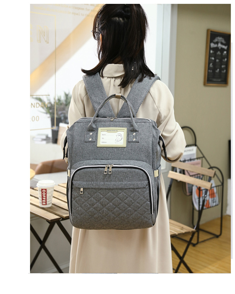 Nuevo modelo mommy bag cama cama plegable baby bag mamá multifuncional recargable impermeable bordado hilo mochila cama cross-border blast pic 23