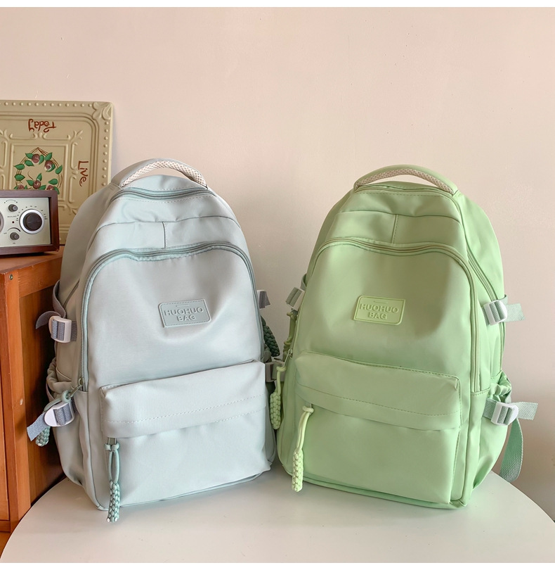 纯色休闲双肩包小学生女初高中书包简约时尚百搭大容量大学生背包详情30