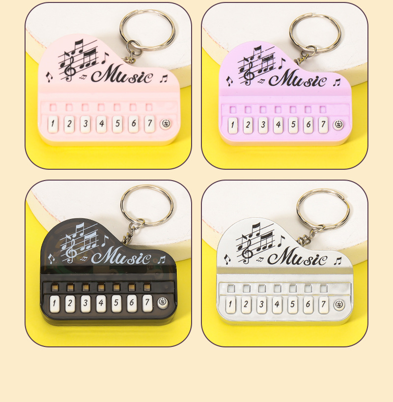 创意发光钥匙扣玩具钢琴演奏家音乐大师迷你儿童电子琴电玩游戏机详情12