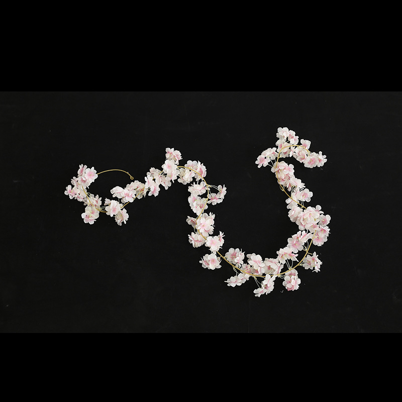 Cherry blossom vines entwined around air conditioning pipes, covering flower stalk trees, simulated peach blossoms, decorative flower vines, artificial flower vines pic 8