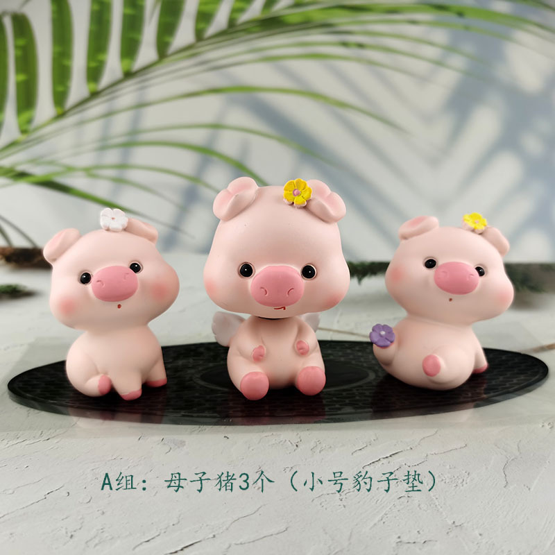 一件代发汽车香水摆件防滑垫树脂摇头公仔萌萌猪告白气球水晶座详情2