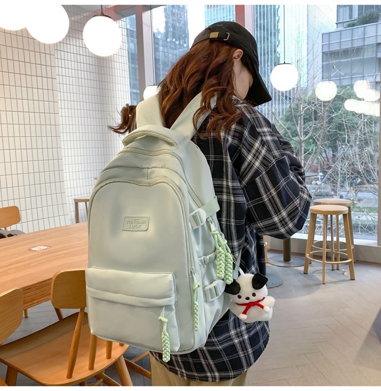 书包大容量高颜值初高中生新款双肩包大容量纯色简约防泼水背包详情19