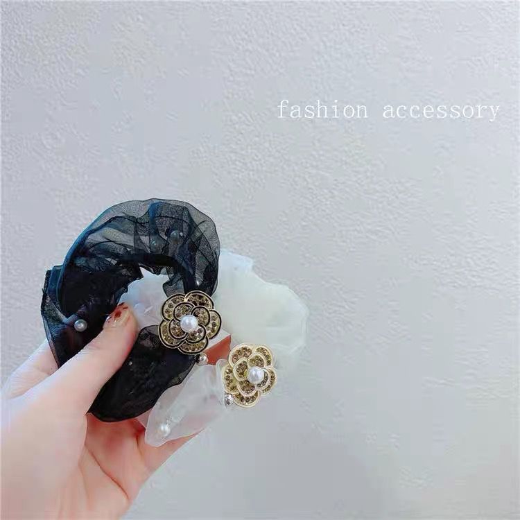 Diamond-encrusted camellia mesh large intestinal hair band Pearl ins Korean high-end style elegant hair tie for women 2023 new style pic 4