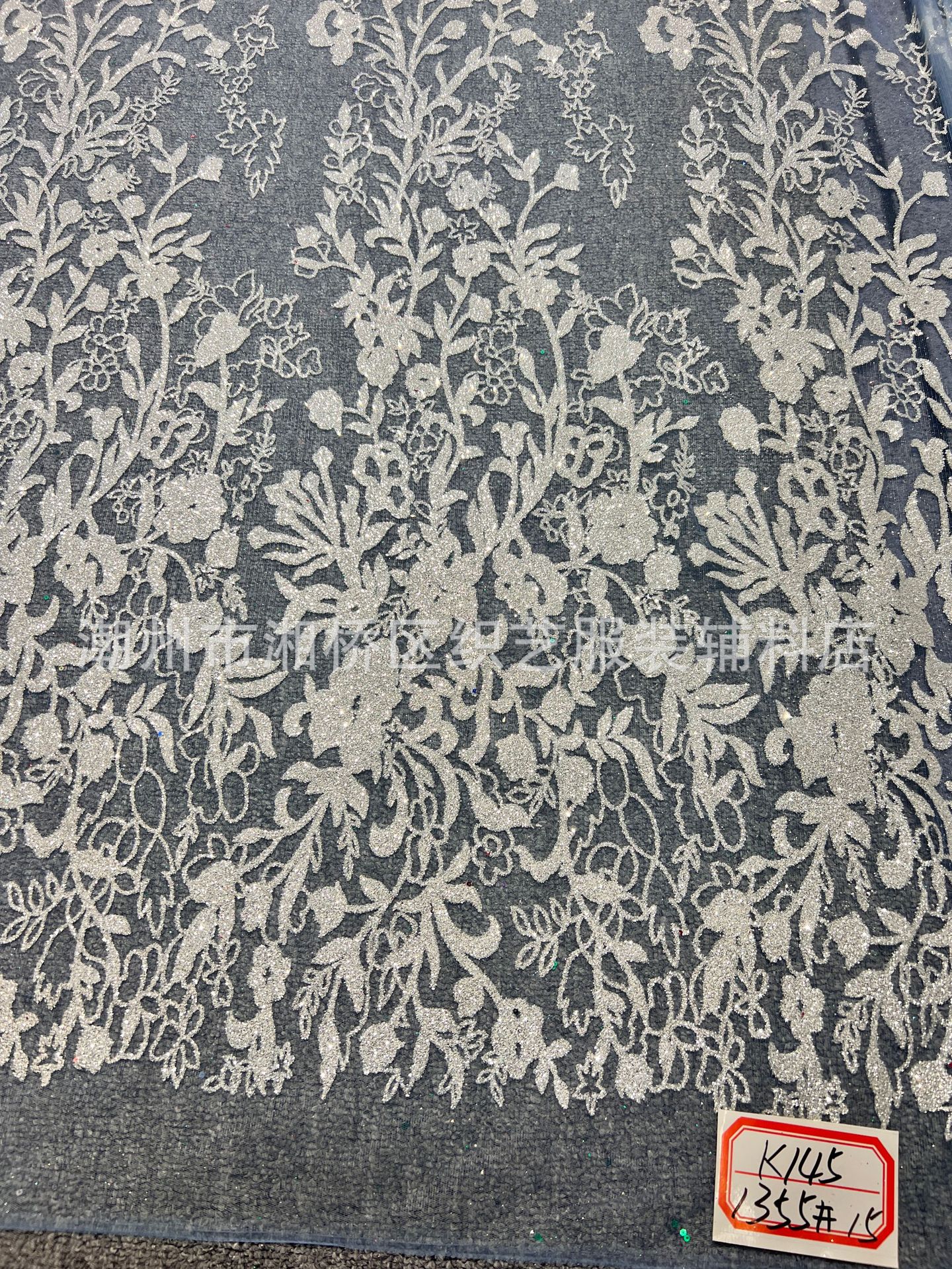 K145 patterned wedding dress fabric in stock, featuring a mesh fabric with gold sheets and gold spray patterns pic 5