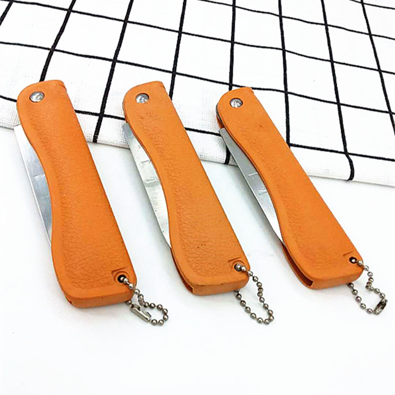 Factory direct sales of folding yellow sleeve knives, multi-functional folding knives, fruit knives wholesale two-yuan products pic 1
