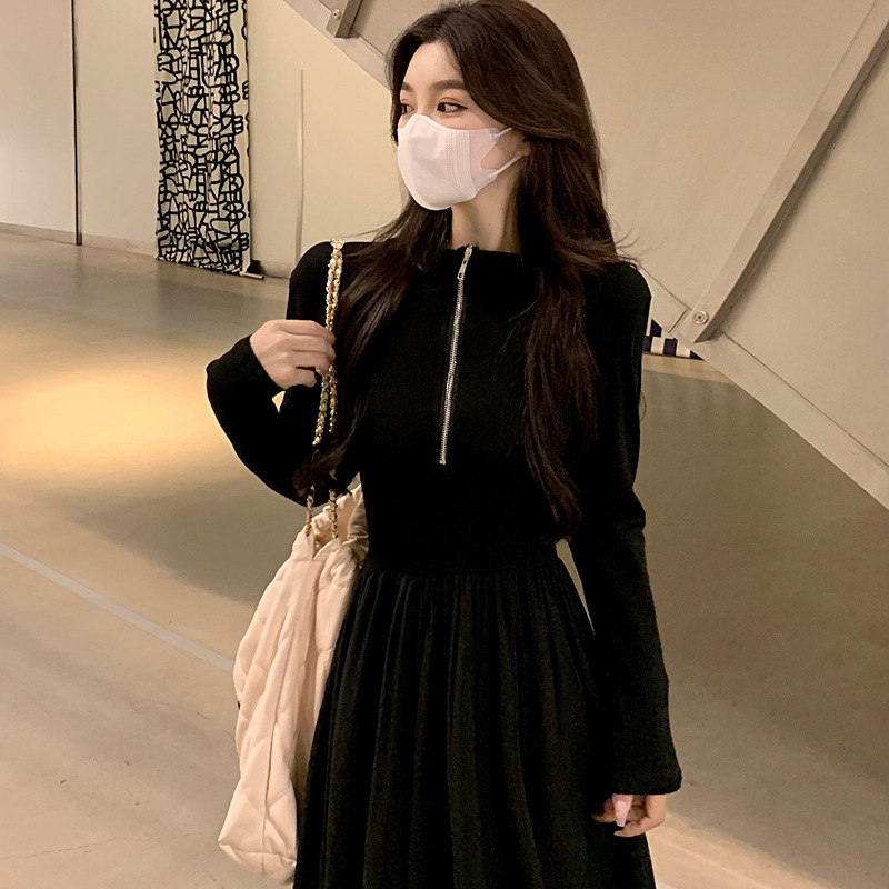 A new black long-sleeved dress for women in the autumn of 2024, featuring a unique semi-zipper design that cinches the waist and accentuates the figure. It is a mid-length dress pic 44