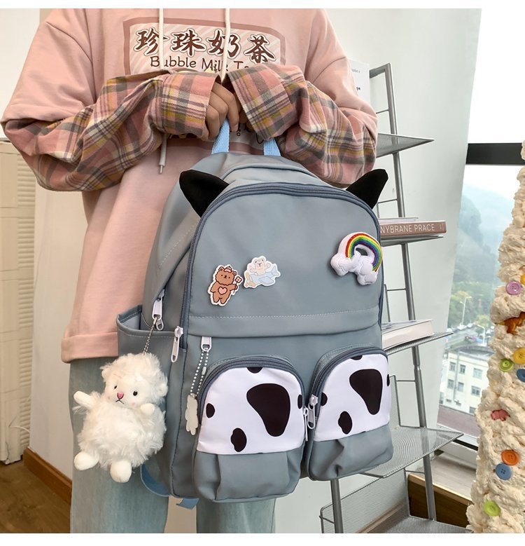 Japanese-style ins campus school style, fresh and cute, cute cow with earbuds, soft girl schoolbag, funny student backpack pic 22