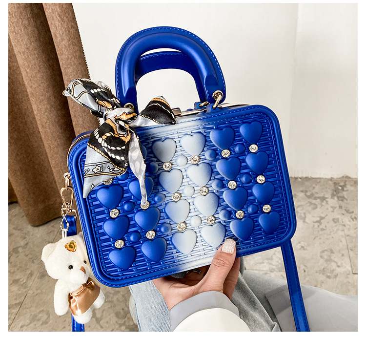 The 2021 Korean version of the trendy tote bag features a ribbon bow, an Instagram niche design with rivets and a slanted crossbody bag made of PU pic 10