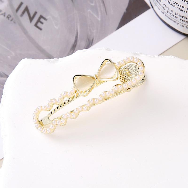 韩版小众设计珍珠蝴蝶结鸭嘴夹发夹2025新款高端气质刘海一字发卡详情2