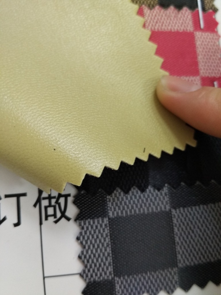 厂家直销多色提花正方格60丝羊皮纹提花发泡时尚背包手袋公文包详情4