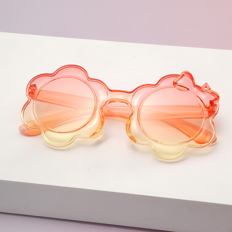 2025一体片彩色儿童太阳镜圆框小孩蝴蝶结眼镜防晒宝宝太阳花墨镜详情5