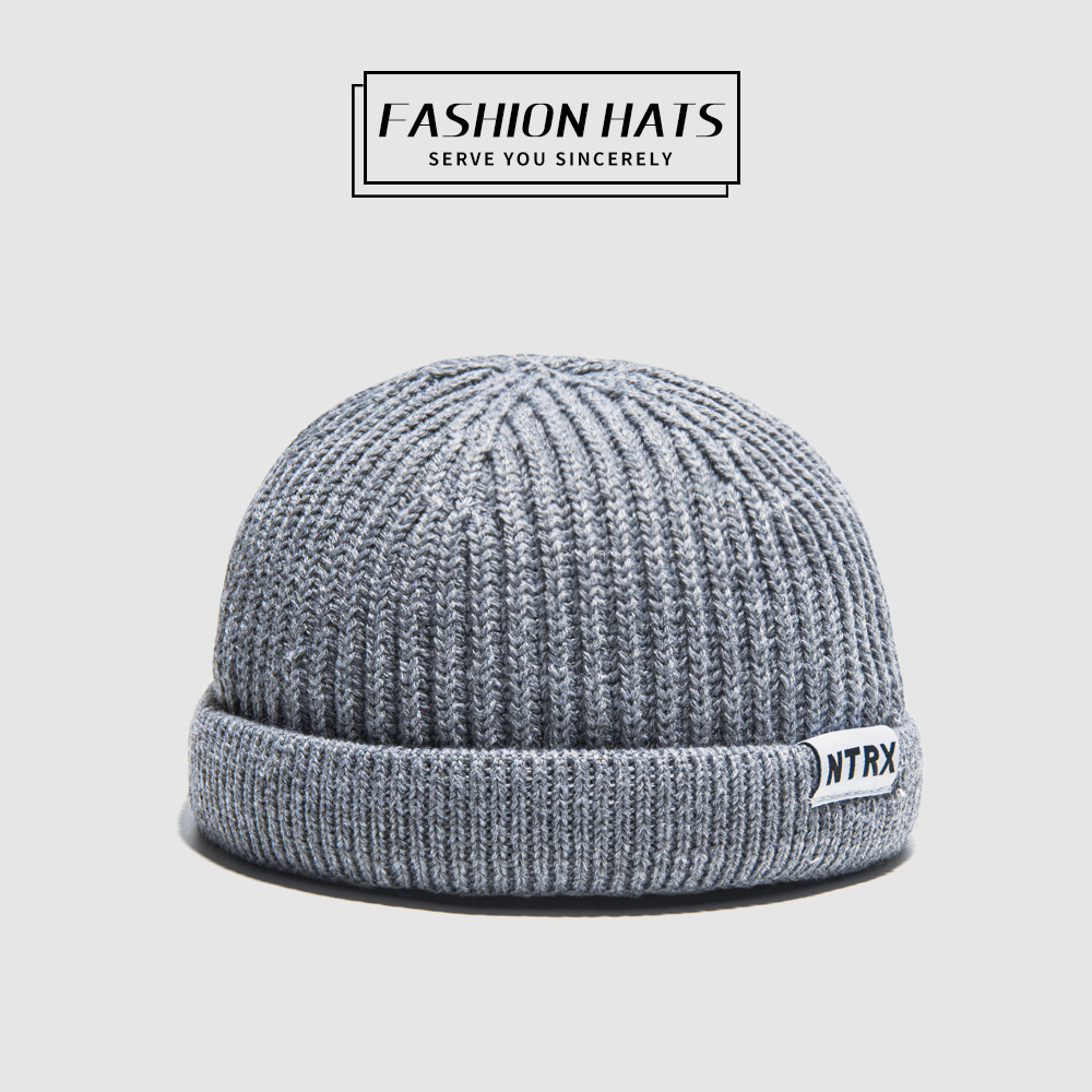 For the autumn and winter of 2021, men and women are wearing Korean-style outdoor casual hats without brims, with rolled edges and round top warp knitted caps pic 2
