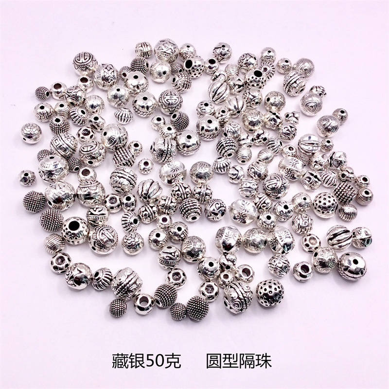 A 50g mixed bag of Tibetan silver bracelets, pendants, alloy jewelry accessories, diy flower trays, spacers, and drum beads pic 9