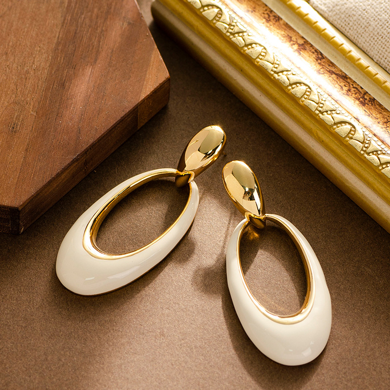 French elegant, retro, mid-style oil-dripping, hollowed-out geometric oval earrings, a niche and unique design sense, silver needle earrings pic 10